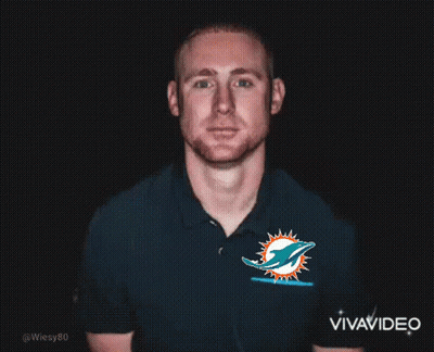 Man In Miami Dolphins Shirt In Dark GIF
