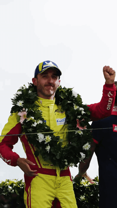 Man In Michelin Hat With Wreath GIF