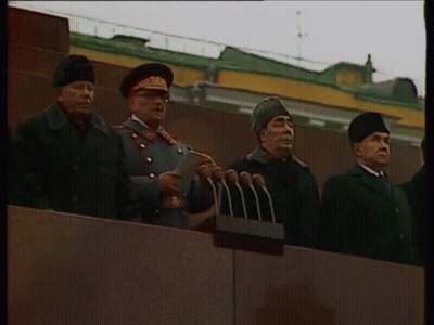 Man In Military Uniform At Microphones GIF