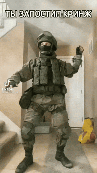 Man In Military Uniform Dancing In Hallway GIF