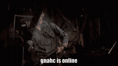 Man In Military Uniform Holding Chainsaw Saying Gnahc Is Online GIF