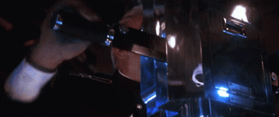 Man In Military Uniform In Dark Room With Blue Lights GIF