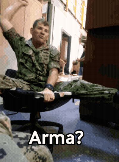 Man In Military Uniform In Office Chair With Arma GIF