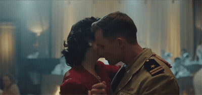 Man In Military Uniform Kissing Woman GIF