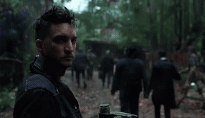 Man In Military Uniform Looking At Camera GIF