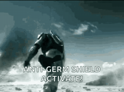 Man In Military Uniform Running With Shield Says Anti-Germ Shield Activate GIF