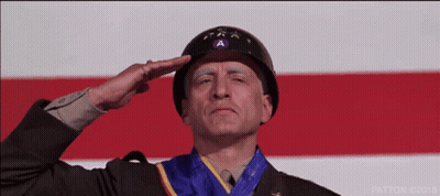 Man In Military Uniform Saluting With Medal GIF