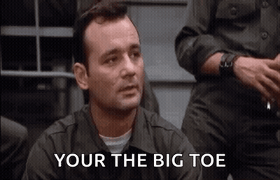 Man In Military Uniform Sitting Before Group GIF