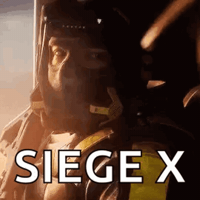 Man In Military Uniform Sitting With Siege X GIF