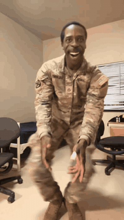 Man In Military Uniform Smiling GIF