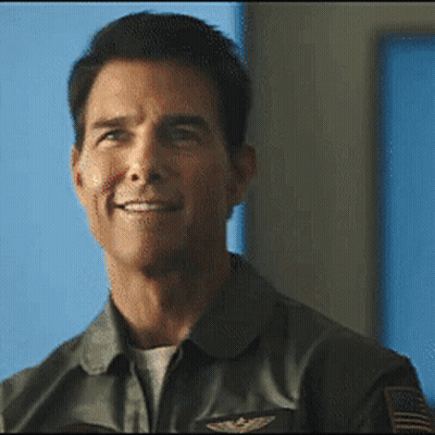 Man In Military Uniform Smiling Looking Away GIF