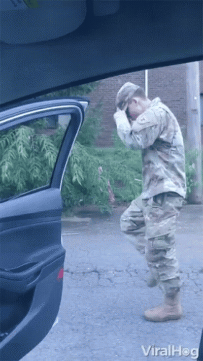 Man In Military Uniform Standing In Front Of Car Viralhog GIF