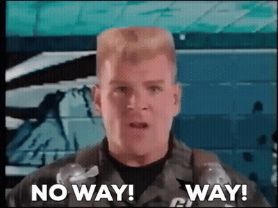 Man In Military Uniform Standing In Front Of Wall GIF