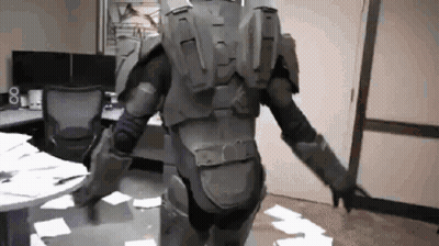 Man In Military Uniform Standing In Room GIF