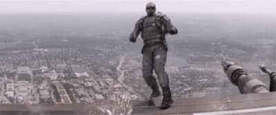 Man In Military Uniform Standing On Building GIF