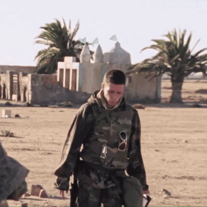 Man In Military Uniform Walking Desert GIF