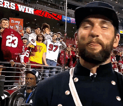 Man In Military Uniform Wearing Number 23 Jersey At Football Game GIF