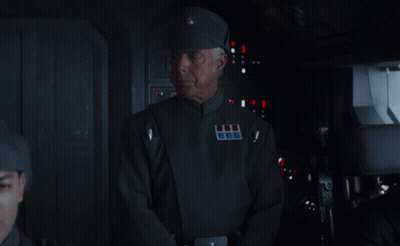 Man In Military Uniform With Commander Badge GIF