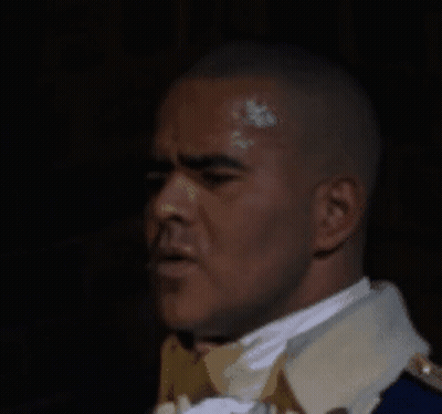 Man In Military Uniform With Face Paint GIF