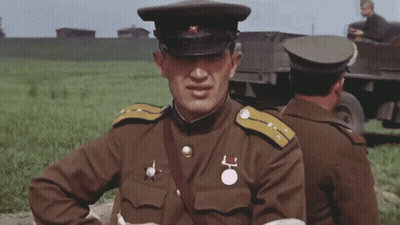 Man In Military Uniform With Medal Saying L GIF