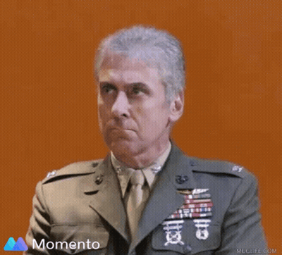 Man In Military Uniform With Momento GIF