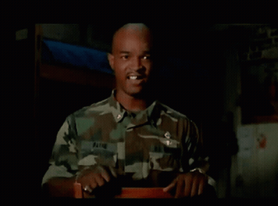 Man In Military Uniform With Payne On Collar GIF