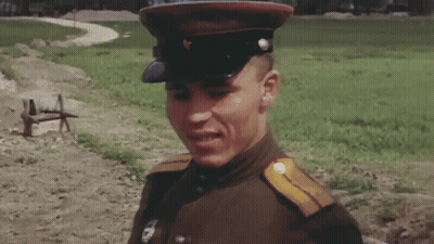 Man In Military Uniform With Shoulder Badge GIF