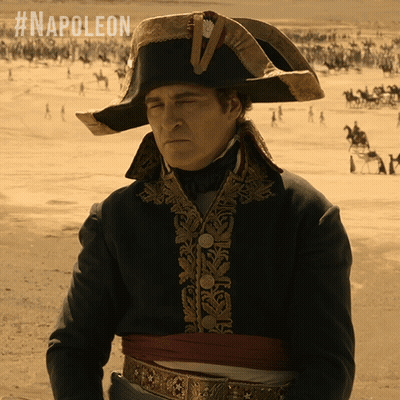 Man In Military Uniform With Sword GIF