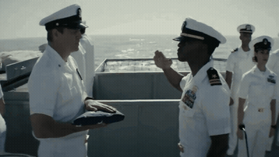 Man In Military Uniform With U.S. Navy Badge GIF