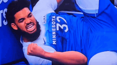 Man In Minnesota 32 Jersey Laying On Ground GIF
