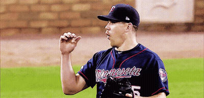 Man In Minnesota Jersey Holding Mitt GIF