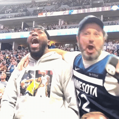 Man In Minnesota Jersey Next To Man With Mouth Open GIF
