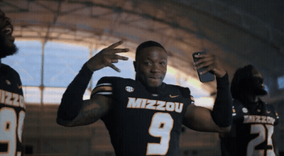 Man In Mizzou Jersey Taking Selfie GIF
