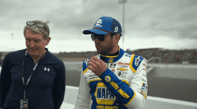 Man In Napa Auto Parts Jacket Next To Man With Sunglasses GIF