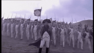 Man In Napoleon Hat Leading Army GIF