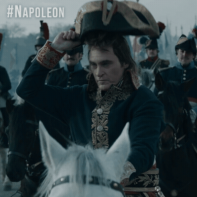 Man In Napoleon Hat Riding Horse GIF