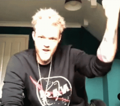 Man In NASA Shirt Raising Fist GIF