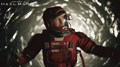 Man In NASA Space Suit In Tunnel GIF