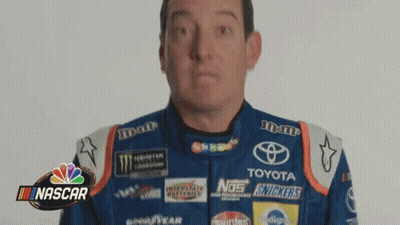 Man In Nascar Uniform Looking At Camera GIF