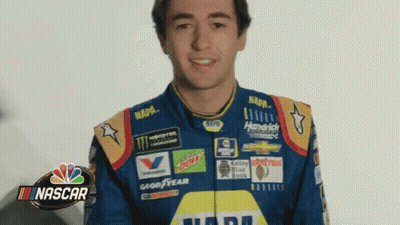 Man In NASCAR Uniform Smiling GIF