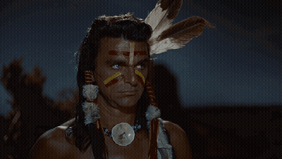 Man In Native American Costume With Feathers GIF