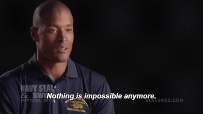 Man In Navy SEAL Shirt Saying Nothing Is Impossible Anymore GIF