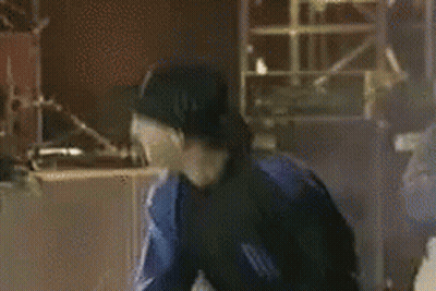 Man In NBC Sports Jersey Smiling Beside Another GIF