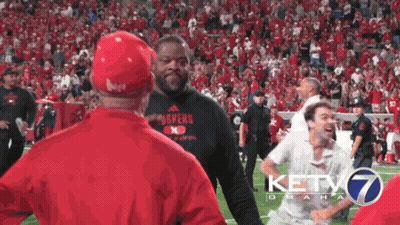 Man In Nebraska Shirt On Field GIF