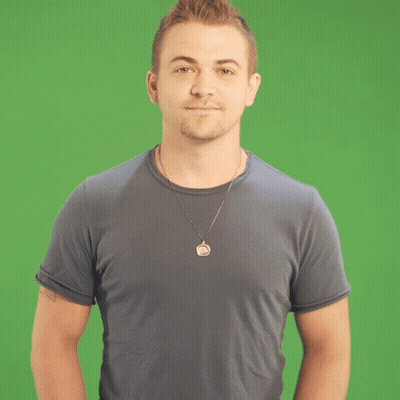 Man In Necklace And Blue Shirt Making Face GIF