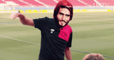 Man In New Balance Shirt Standing On Field GIF