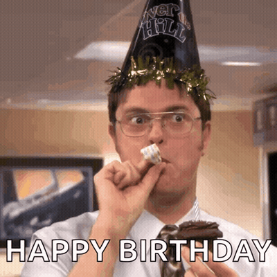 Man in New Year's Eve Hat Eating Cake