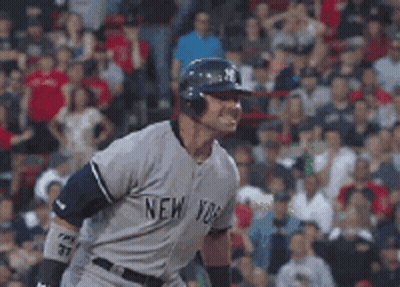 Man In New York Jersey In Front Of Crowd GIF