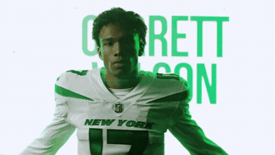 Man In New York Jets Jersey On Green Background GIF