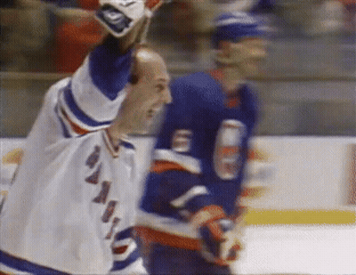 Man In New York Rangers Jersey Standing On Ice GIF